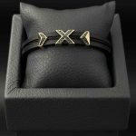 دستبند چرم وسط استیل ایکس نگین دار