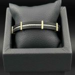 دستبند چرم ریتم وسط استیل