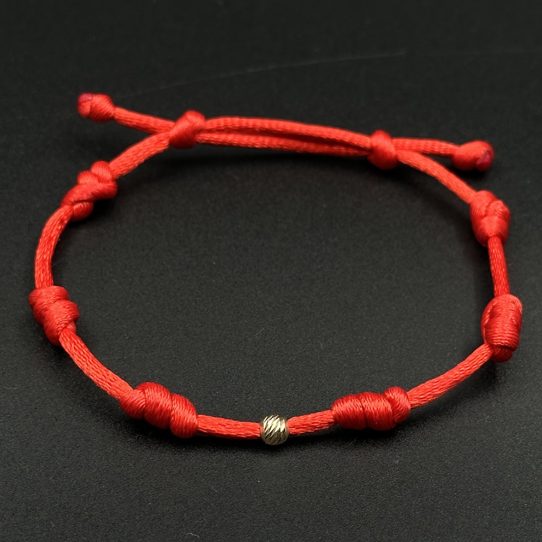 IMG_2037 دستبند بافت رد استرینگ ( red string ) هفت گره ضخیم